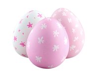 Pink and white decorative Easter eggs with delicate floral pattern on isolated background, festive spring holiday celebration elements.
