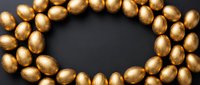 Golden eggs arranged in circular pattern on dark background creating luxurious Easter holiday decoration for festive celebration and spring seasonal design.