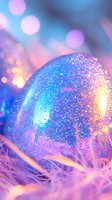 Magical snow globe with sparkling glitter inside against dreamy bokeh background in pink and blue tones, nestled in soft feathers creating ethereal winter atmosphere.