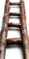 Rustic wooden ladder with weathered brown timber rungs isolated on white background, suitable for design projects, clipart, and vintage decor concepts.