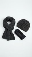 Charcoal gray knitted winter accessories set with ribbed scarf, beanie hat and leather gloves isolated on white background for cold weather fashion.