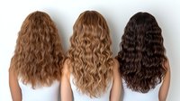 Long wavy hair in different natural shades shown from behind on white background. Three female hairstyles demonstrate variety of curl patterns and colors.