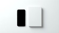 Modern smartphone with blank screen next to white rectangular box on clean surface for product mockup and branding presentation.