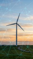 Wind turbine standing in rural landscape at sunset with digital network overlay representing renewable energy connectivity and smart grid technology for sustainable power generation.