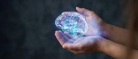 Hands holding glowing digital brain with neural networks and connections for artificial intelligence, neuroscience, and technology concepts.