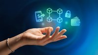 Businessman hand holding digital icons representing blockchain technology, cryptocurrency wallet, and secure financial transactions on blue background.