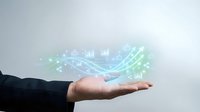Business professional hand presenting holographic data visualization with charts, graphs and digital analytics floating above palm for technology presentations.