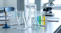 Modern laboratory with glassware beakers flasks test tubes for scientific research experiments analysis chemistry biology medical testing education.