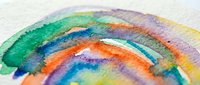 Vibrant watercolor rainbow with flowing paint strokes on textured paper. Artistic design element for creative projects, greeting cards, and decorations.
