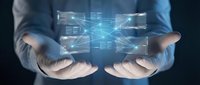Business professional holding holographic data visualization with glowing network connections and digital interface elements for technology presentations.