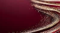 Elegant swirling golden glitter trail on deep burgundy background creates luxurious flowing curves and waves with sparkling particles for festive holiday designs.