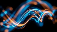 Abstract flowing light waves in blue and orange neon colors creating dynamic motion against dark background for modern design projects.