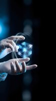 Hands holding glowing digital cube with interconnected network nodes on dark background, representing data technology, innovation, and digital transformation for business solutions.