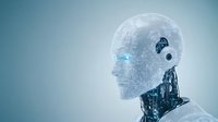 Glowing translucent humanoid head with digital network pattern and robotic neck elements against soft blue background represents artificial intelligence and future technology.