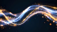 Glowing blue and gold light waves with sparkles and particles flowing on dark background, abstract magical energy stream effect for luxury designs.