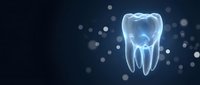 Glowing blue tooth with roots on dark background with bokeh lights for dental care and oral health concepts in medical presentations.