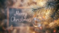 Transparent glass ornament with Merry Christmas inscription hanging on snowy pine tree, warm bokeh lights and chalkboard in background.