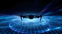 Futuristic drone hovering over glowing digital grid with blue light beams and data visualization effects for technology and innovation concepts.