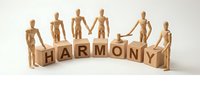 Wooden figures holding hands around stacked blocks spelling harmony, representing unity, teamwork, cooperation, and togetherness in business and community settings.