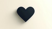 Black heart shape casting soft shadow on beige background, minimalist romantic design element isolated for valentines cards and love concepts.