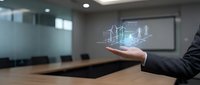 Businessman presenting holographic wind turbines in modern conference room showcasing renewable energy technology and sustainable power solutions for corporate presentations.