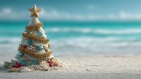 Sandy Christmas tree decorated with seashells and starfish on tropical beach with turquoise ocean background, perfect for holiday travel concepts.