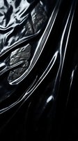Abstract black liquid metal surface with flowing curves and reflective highlights creating dynamic futuristic texture for modern design projects.