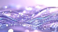 Magical purple waves with glowing sparkles and bokeh lights creating dreamy abstract background for luxury designs and festive decorations.