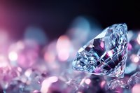 Brilliant cut diamond on pink and blue bokeh background with soft focus reflections and sparkles, luxury jewelry concept for wedding and engagement designs.