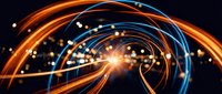Dynamic light trails creating spiral motion with orange and blue glowing streaks against dark background for technology and energy concepts.