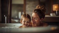 Caucasian mother and daughter sharing joyful bath time moment, creating bonding experience in warm, intimate bathroom setting with soft lighting.