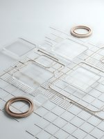 Minimalist white geometric layout with copper wire rings and perforated paper elements arranged on clean background for modern design projects.