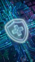 Digital healthcare cybersecurity shield with medical cross symbol on futuristic circuit board background for data protection and telemedicine security.