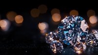 Sparkling diamonds with blue tint on dark background with golden bokeh lights, luxury jewelry macro photography showing brilliant cut and reflections.