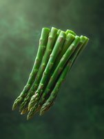 Fresh green asparagus spears floating on dark background with soft lighting and dramatic shadows. Natural organic vegetables for healthy eating concept.