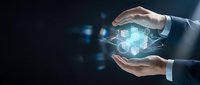 Businessman holding glowing hexagonal digital network structure between hands against dark background, representing data technology, innovation, and connectivity for business solutions.