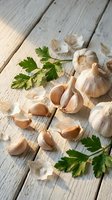 Fresh garlic bulbs and cloves with parsley on rustic wooden planks for culinary cooking and healthy organic food preparation.