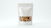 White resealable stand-up pouch with transparent window showing mixed nuts, seeds, and dried fruits, isolated on light background for packaging mockup use.