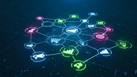 Digital network of glowing business icons connected by lines on dark blue background representing modern technology and corporate connectivity solutions.