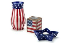 Patriotic ceramic tableware set featuring red and white striped vase with stars, flag-patterned cube container, and star-shaped dish. Perfect for holiday decor and entertaining.