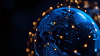 Glowing digital Earth globe with connected network points and orange bokeh lights against dark background showing global connectivity and technology concept.