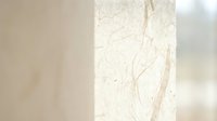 Elegant marble texture with natural veining patterns in soft beige and cream tones for luxury interior design and sophisticated backgrounds.
