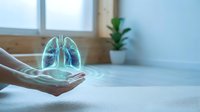 Holographic lungs floating above open hands in modern wellness space for respiratory health and medical technology concepts.