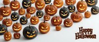 Carved jack-o-lantern pumpkins with glowing faces arranged on white background for seasonal decorations and holiday celebrations.
