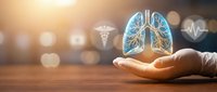 Hand protecting glowing lungs with medical icons in background representing respiratory health care and pulmonary system protection concept.