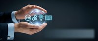 Business hands protecting glowing innovation icons representing technology management and digital transformation in corporate environment.