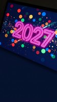 Smartphone displaying bright pink neon 2027 numbers with colorful confetti dots and sparkles on dark blue background for New Year celebration.