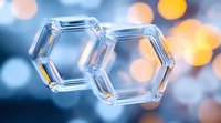 Transparent hexagonal glass shapes with bokeh light effect in blue and orange tones, macro photography on blurred background. Modern minimalist composition.