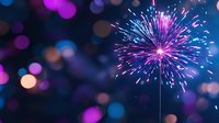 Vibrant pink and blue fireworks explosion against dark night sky with blurred bokeh lights creating magical festive atmosphere for celebration backgrounds.