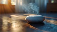 Smooth gray stone with rising steam on wooden surface in warm sunlight, creating peaceful zen atmosphere for wellness, meditation and spa concepts.